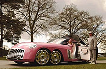Lady Penelope and her chauffeur Parker with FAB 1 / FAB 1 flying to Tracy Island (2004 movie)