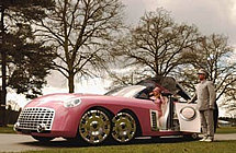 Lady Penelope and her chauffeur Parker with FAB 1 / FAB 1 flying to Tracy Island (2004 movie)